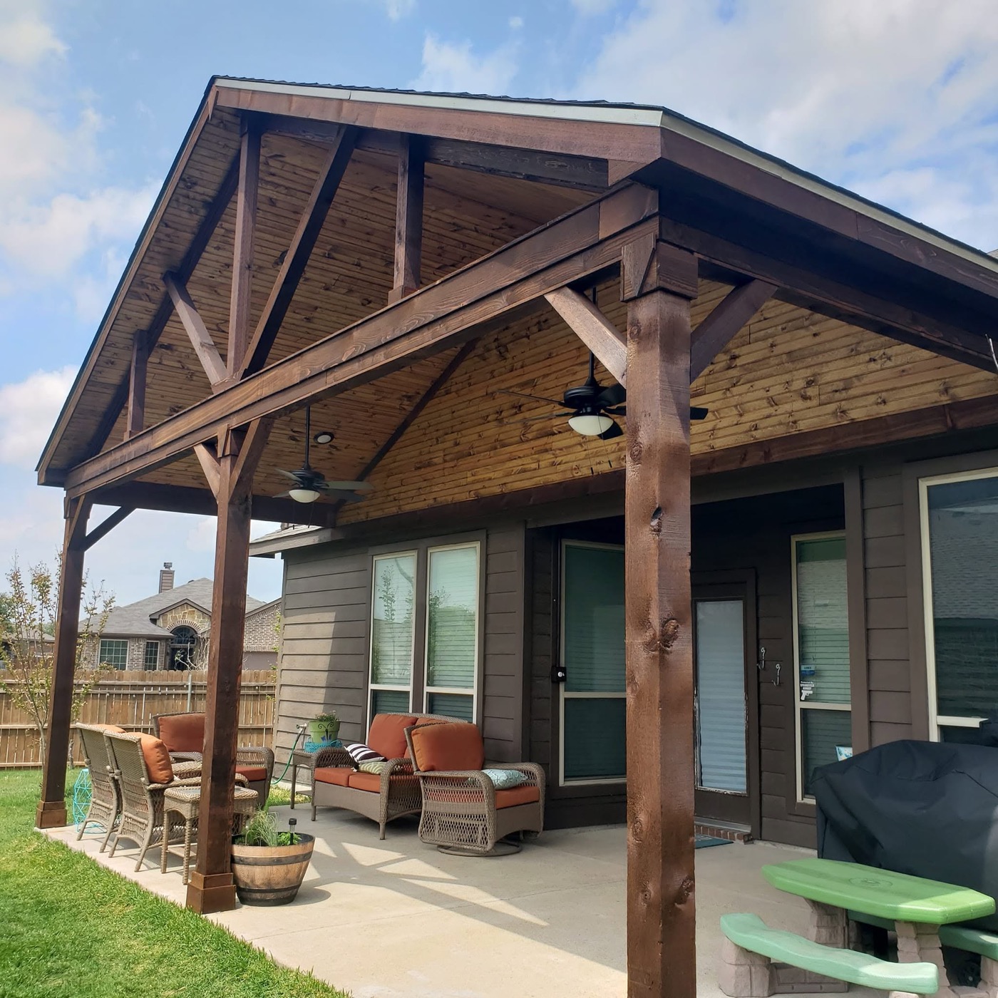 Timber gable patio cover with furnished patio in Fort Worth